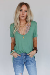 Front view of the Scoop Neck Bralette Tee in Sage, featuring a relaxed fit, soft fabric, and a flattering scoop neckline for effortless layering.