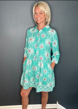 Model showcasing the Alcee Blue and White Resort Shirt Dress by ModaPosa, featuring side pockets, breathable cotton fabric, and boho summer style.