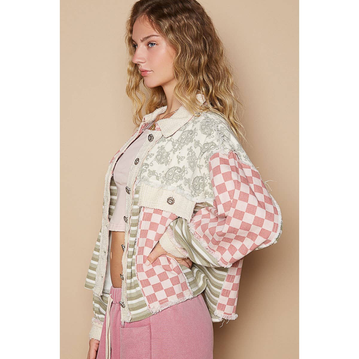 Side view of the Pol Clothing Stripe Pattern Casual Jacket highlighting its pink checkered sleeves, green striped accents, and relaxed fit.