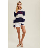Full-body view of model wearing the Wishlist Beachy Embroidered Striped Sweater Top paired with white denim shorts and sandals for a casual beach look.