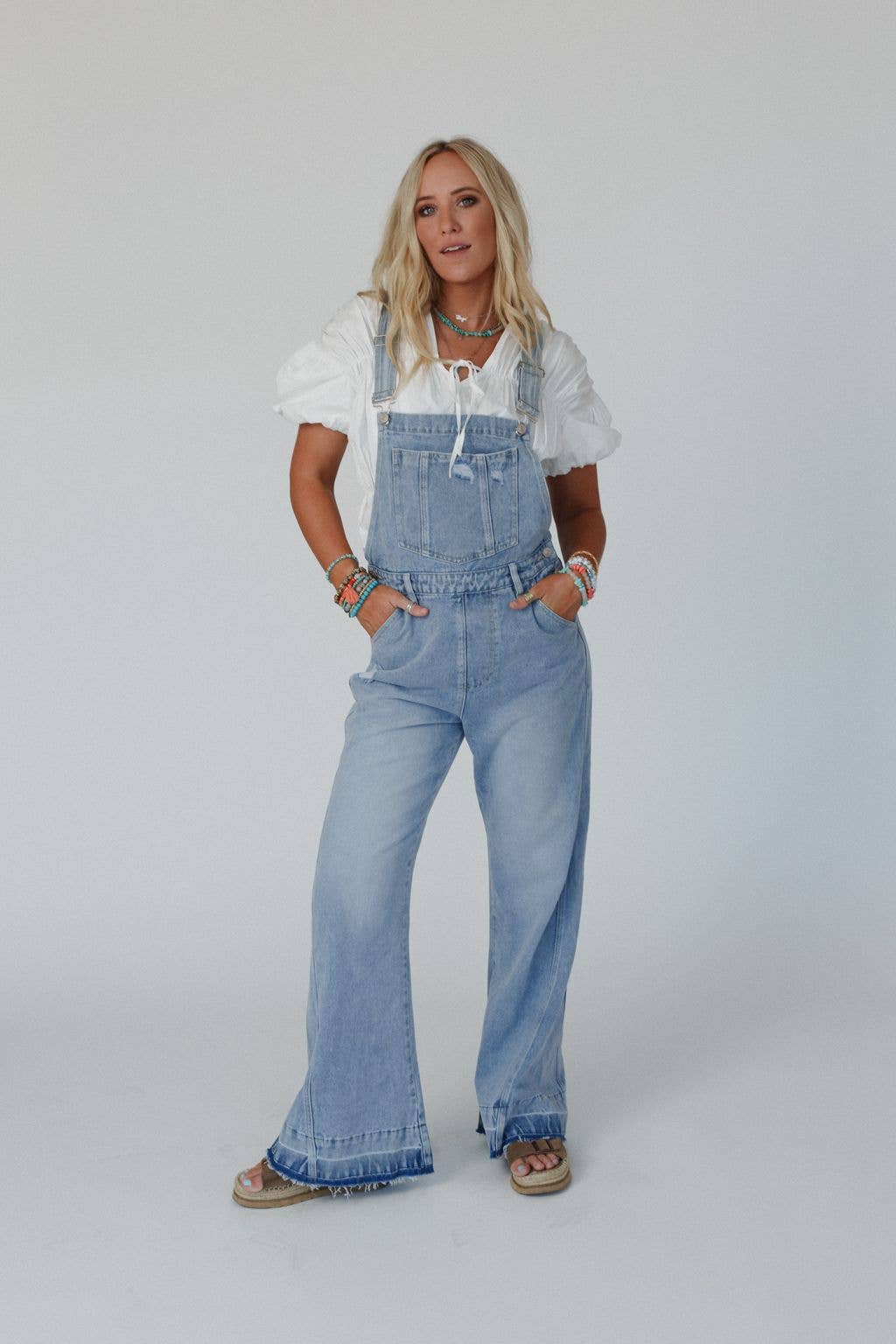 Full-body front view of the Cali Dream Denim Overalls styled for a casual boho look.