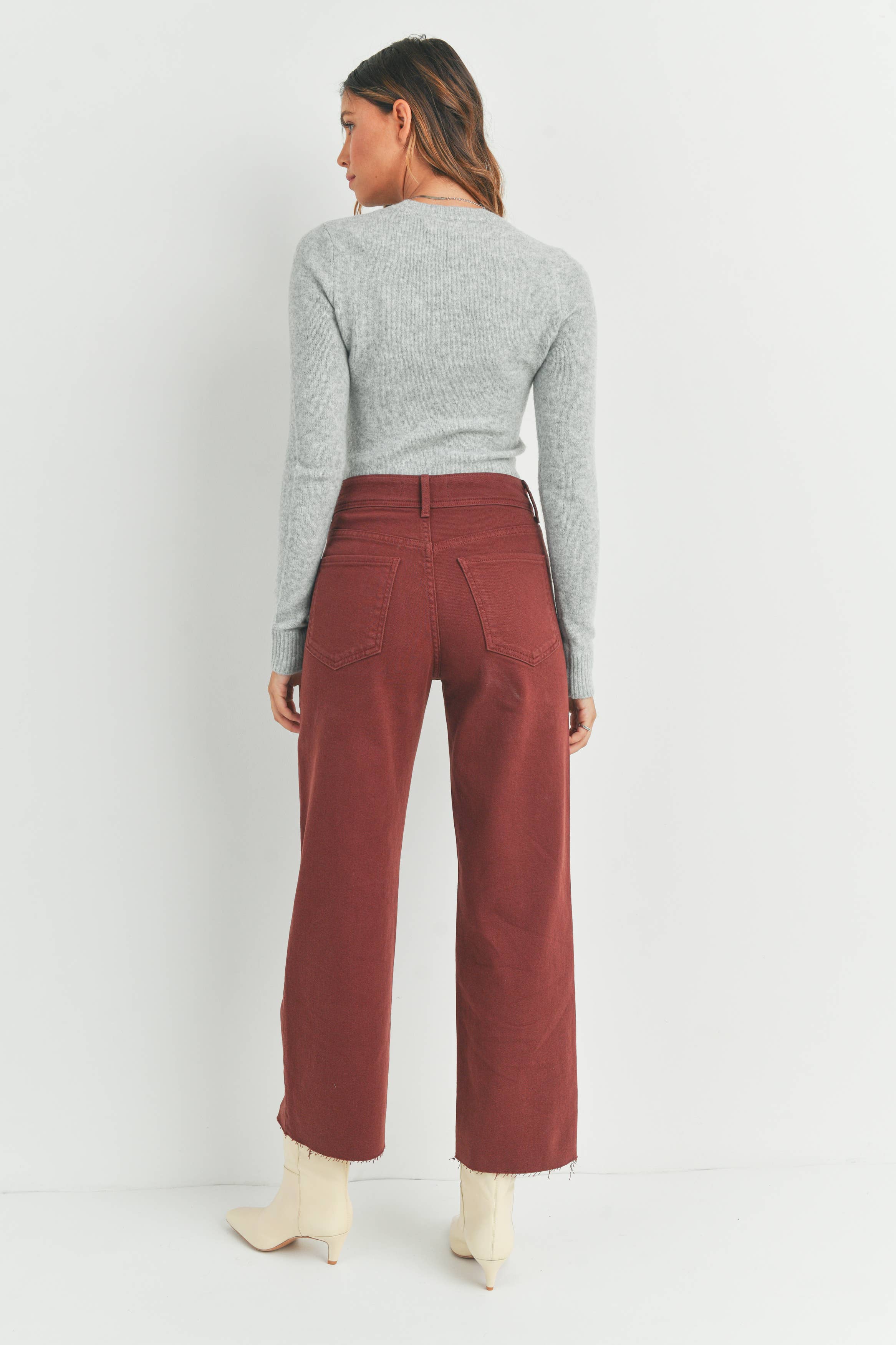 Back view of the CINNAMON High Rise Wide-Leg Jeans by Just Black Denim, featuring roomy pockets and a high-rise fit.