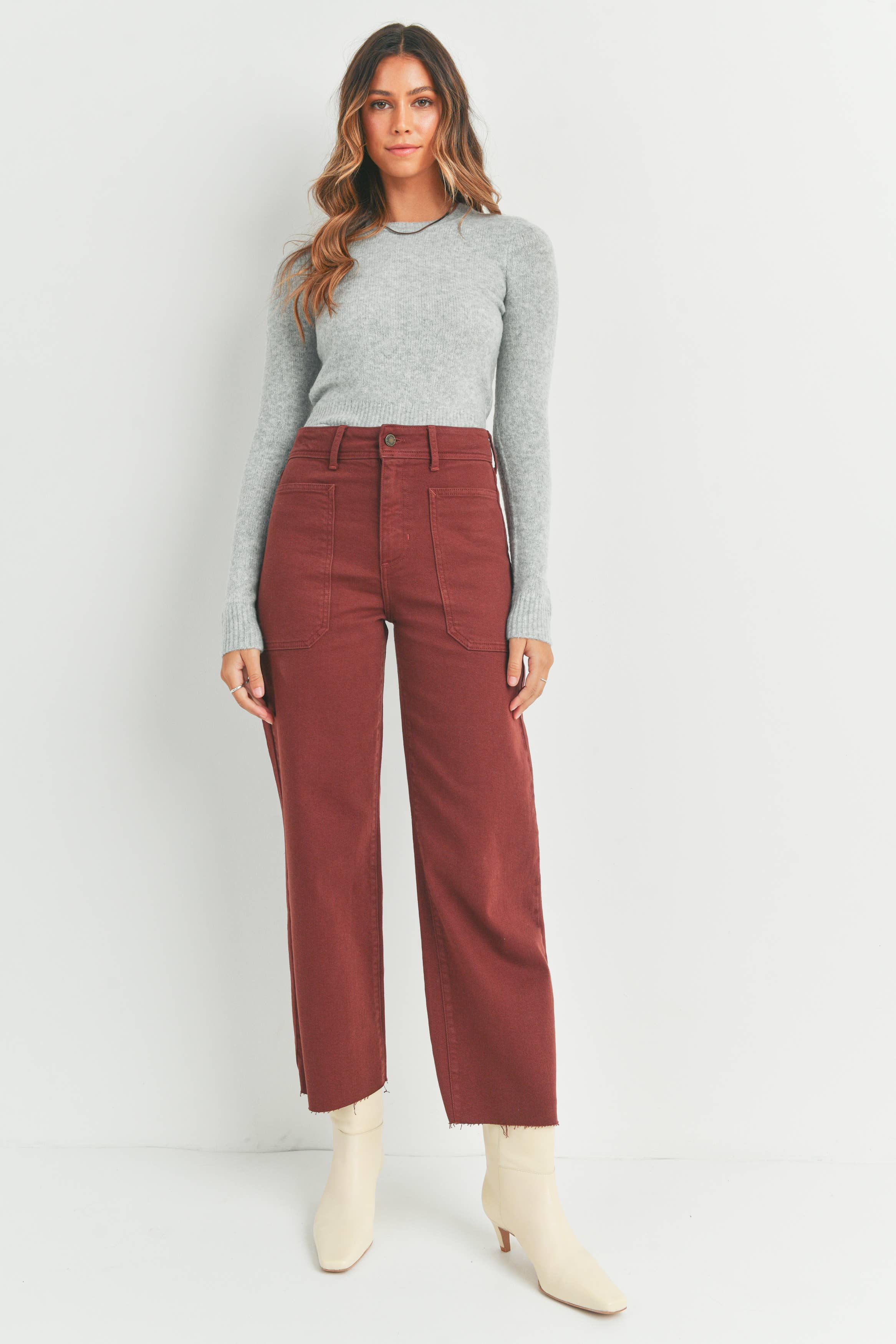 Front view of the CINNAMON High Rise Wide-Leg Jeans by Just Black Denim in terracotta with a raw edge hem.