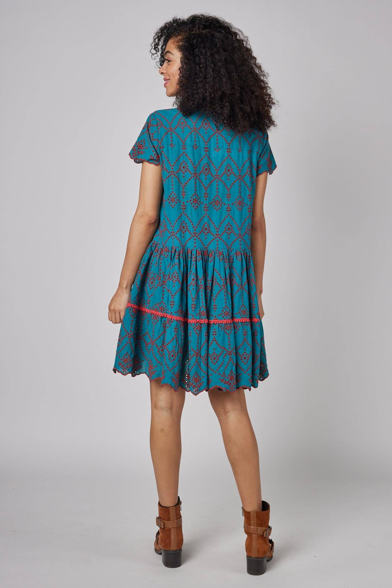 Back view of the MODAPOSA Simonetta Hand Embroidered Fall Dress, showcasing delicate embroidery, a tiered skirt, and scalloped hem in a boho-chic style.