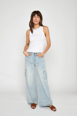 Front view of the Madison Cargo Wide Leg Mid Rise Jeans by Oliver Logan in Hotel California, designed with a mid-rise waist, cargo pockets, relaxed fit, and crafted from sustainable denim.