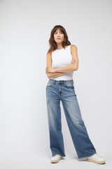 Front view of the Madison Wide Leg Mid Rise Jeans by Oliver Logan in Highway 66, designed with a mid-rise waist, relaxed fit, and crafted from sustainable denim.