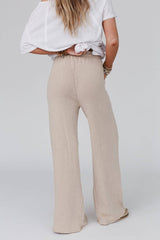 Back view of Three Bird Nest Relaxing Robin Wide Leg Pant in New Taupe showing elastic waistband and relaxed fit.