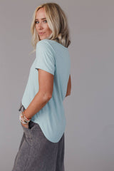 Back side view of the Three Bird Nest Scoop Neck Bralette Tee in washed seafoam, featuring a relaxed fit and soft fabric.