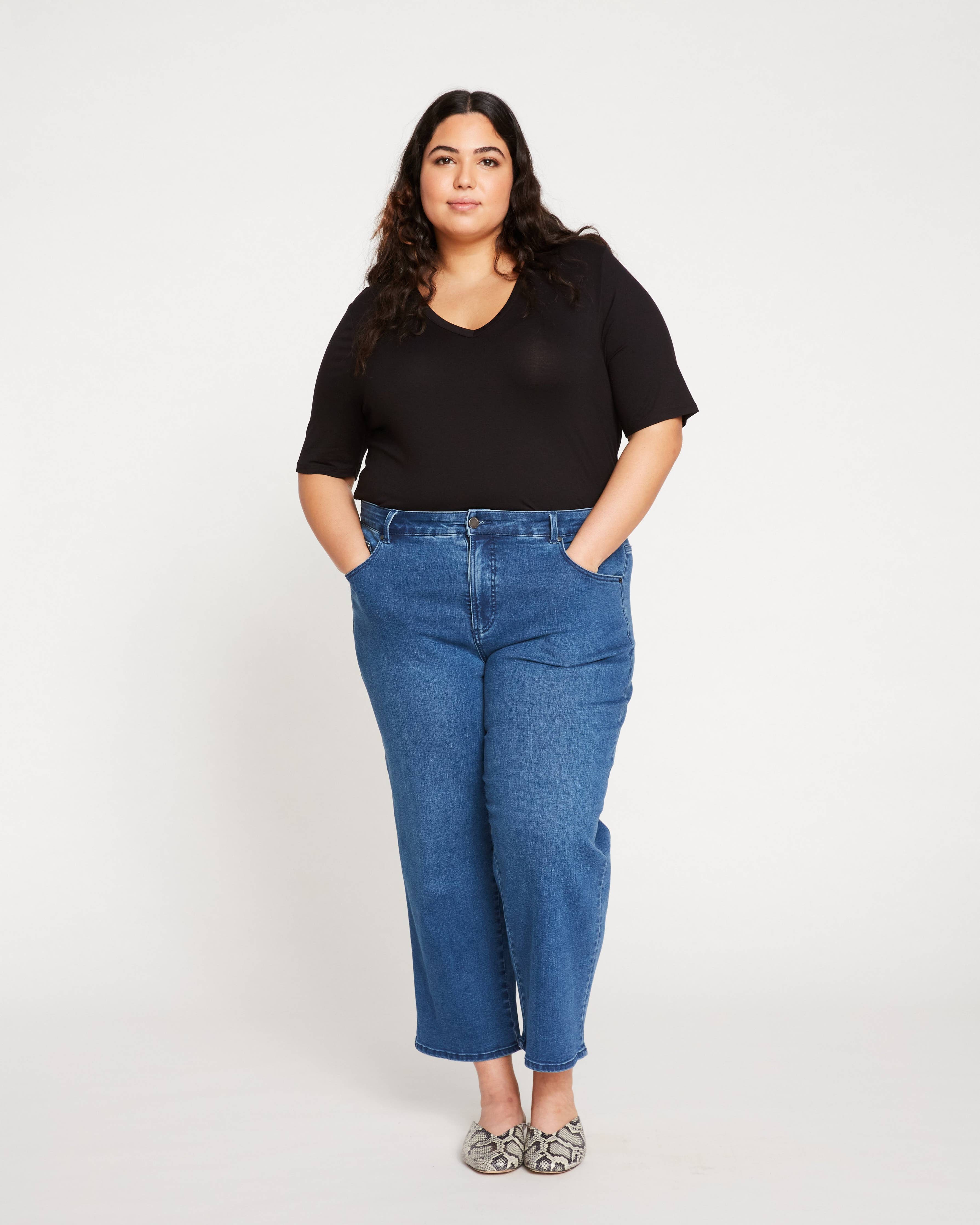 Front view of the Universal Standard Bae Boyfriend Crop Jeans in True Blue, featuring a relaxed fit and classic five-pocket design in extended plus size.