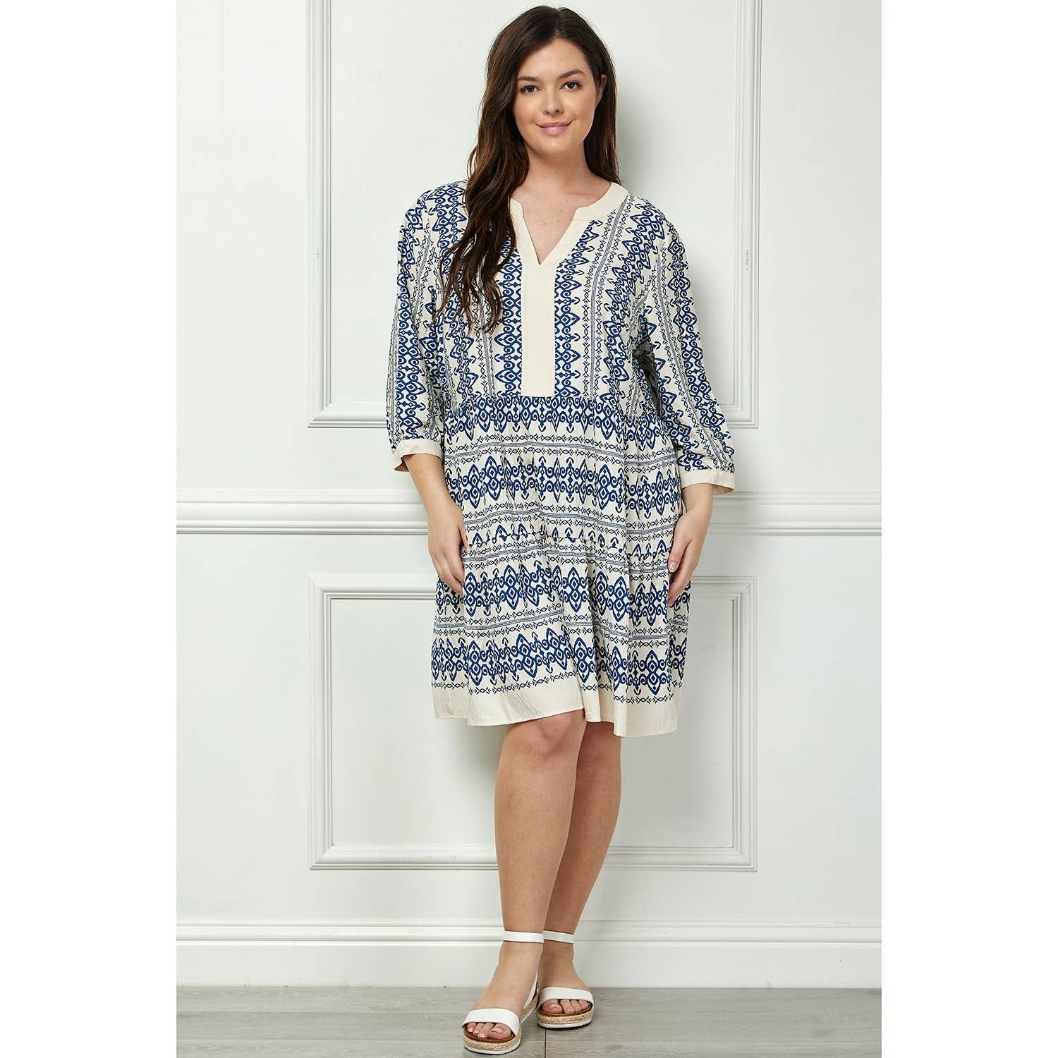 Front view of the Winslow Collection long sleeve blue and white print dress in plus size, featuring a relaxed fit and boho-inspired design.